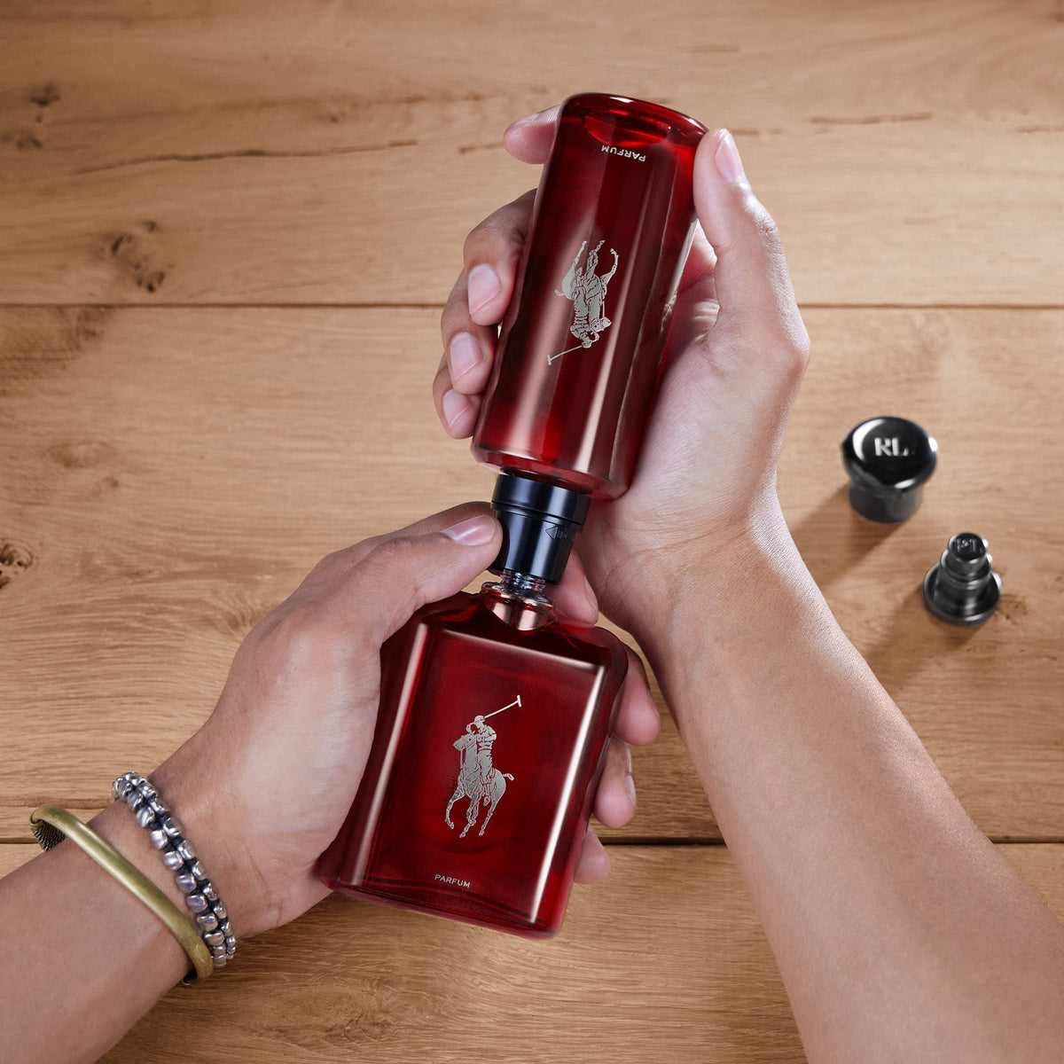 Close-up of cedarwood-absinthe notes in Polo Red Parfum evokes sensual depth.