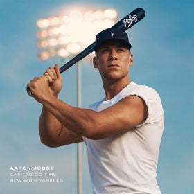 Ralph Lauren Polo 67 wear scene, man applying fragrance for a refined approach.