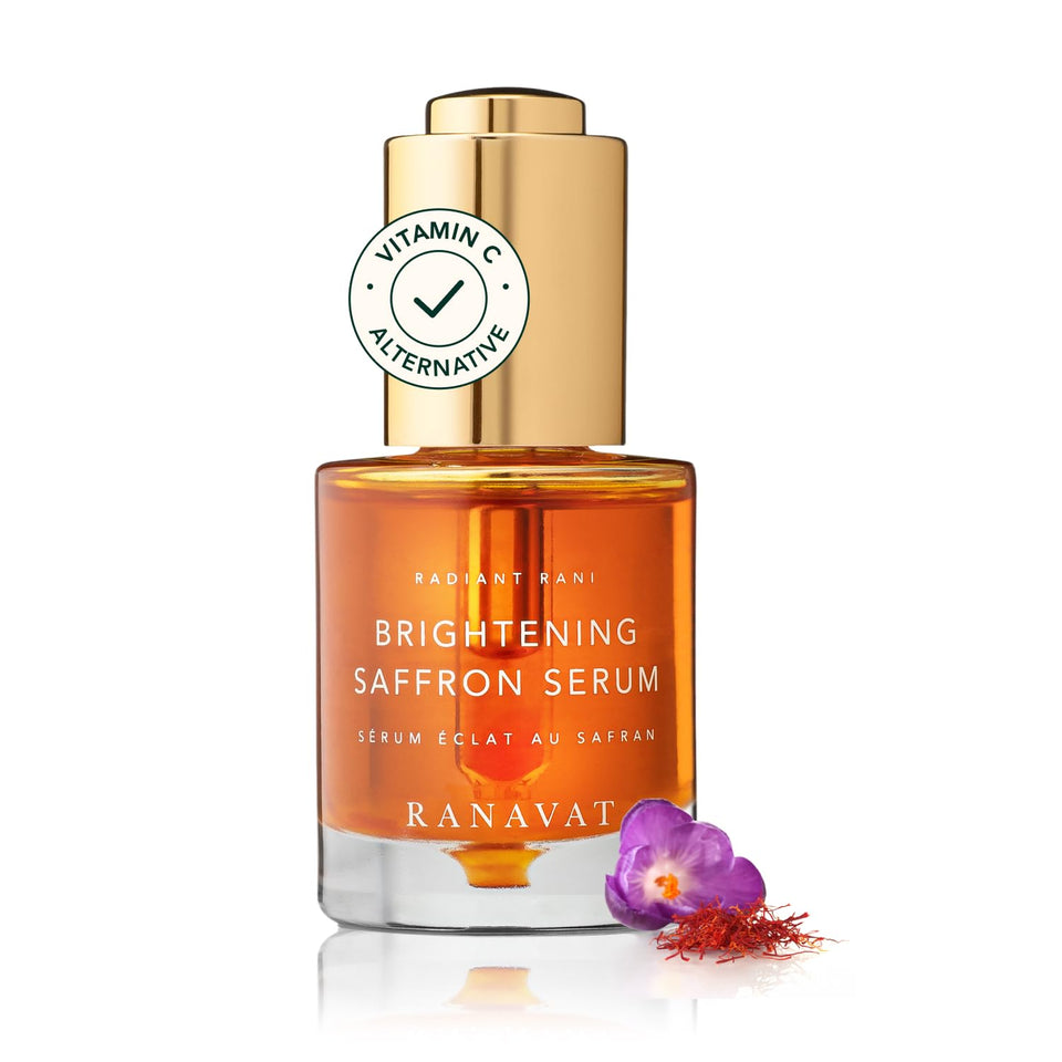 RANAVAT BOTANICS Brightening Saffron Serum bottle catching light for a radiant glow.