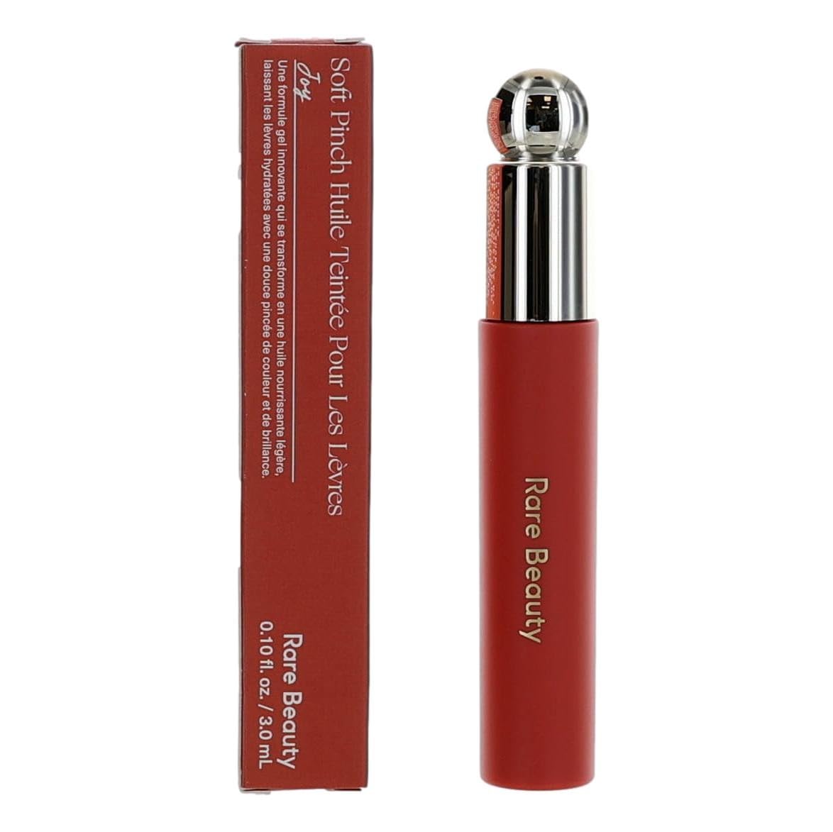 Rare Beauty Soft Pinch Lip Oil Joy offers a hydrating, sheer pink tint for daily lips.