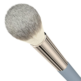 Ravie Beauty travel-friendly blush brush in compact form