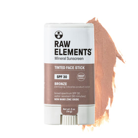 Raw Elements Bronze face tint stick packaging shows reef-friendly sunscreen for on-the-go protection