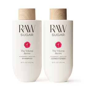 Raw Sugar Volume Revive shampoo bottle signals lift and lightness for refreshed hair.