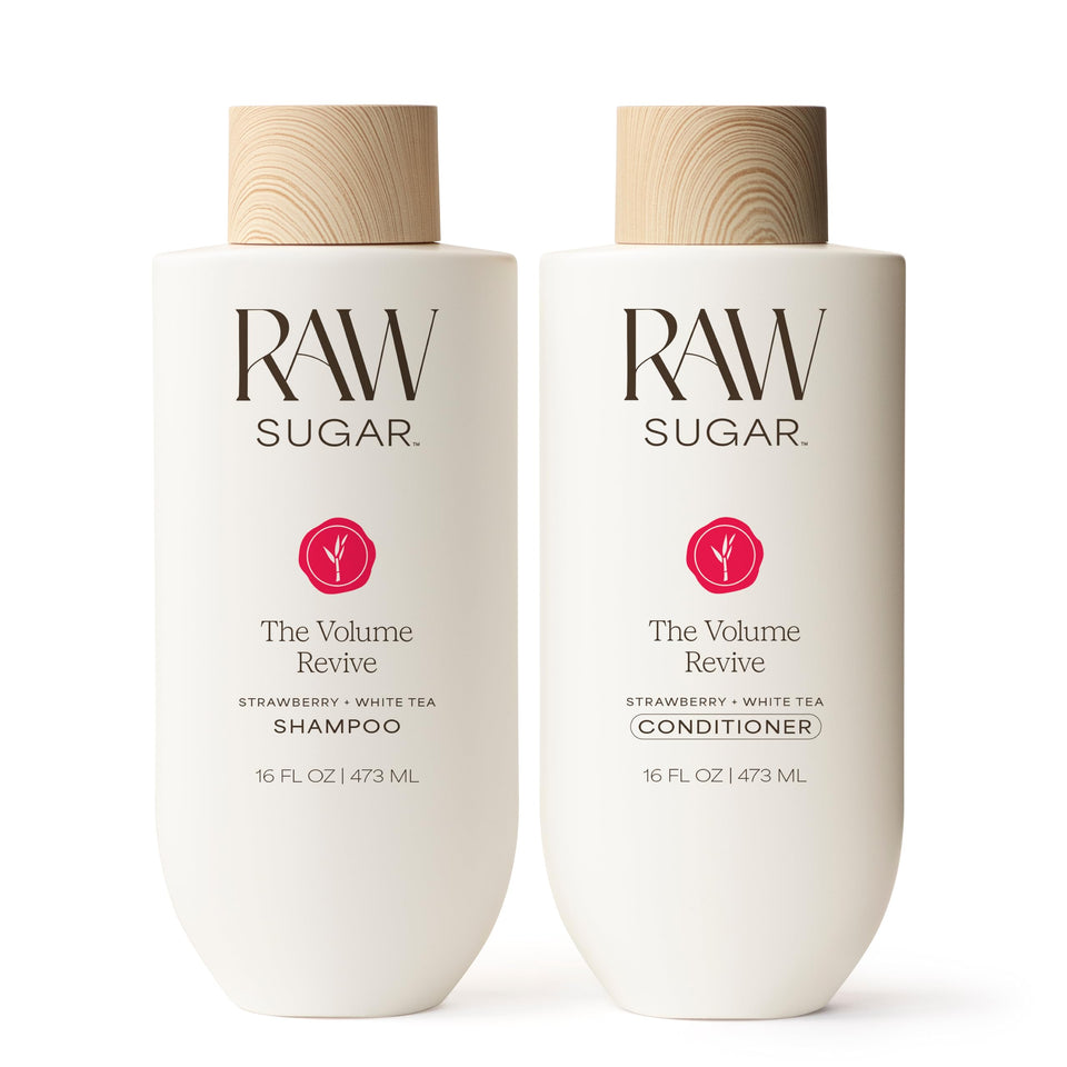 Raw Sugar Volume Revive shampoo bottle signals lift and lightness for refreshed hair.