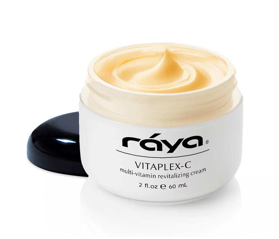 Raya Vitaplex-C Cream tube being squeezed for daily facial hydration