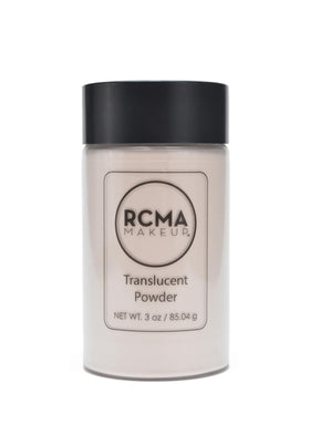 RCMA translucent powder bottle close-up showing weightless finish and no flashback