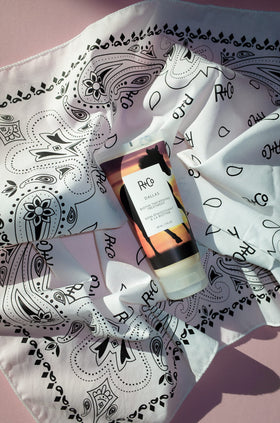 R+Co Dallas Biotin Thickening Treatment in use on hair for texture