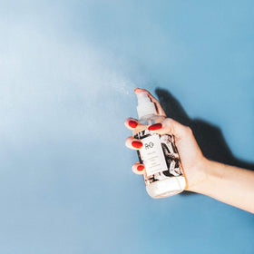 R+Co Dallas Thickening Spray label view highlighting vegan, cruelty-free formula.