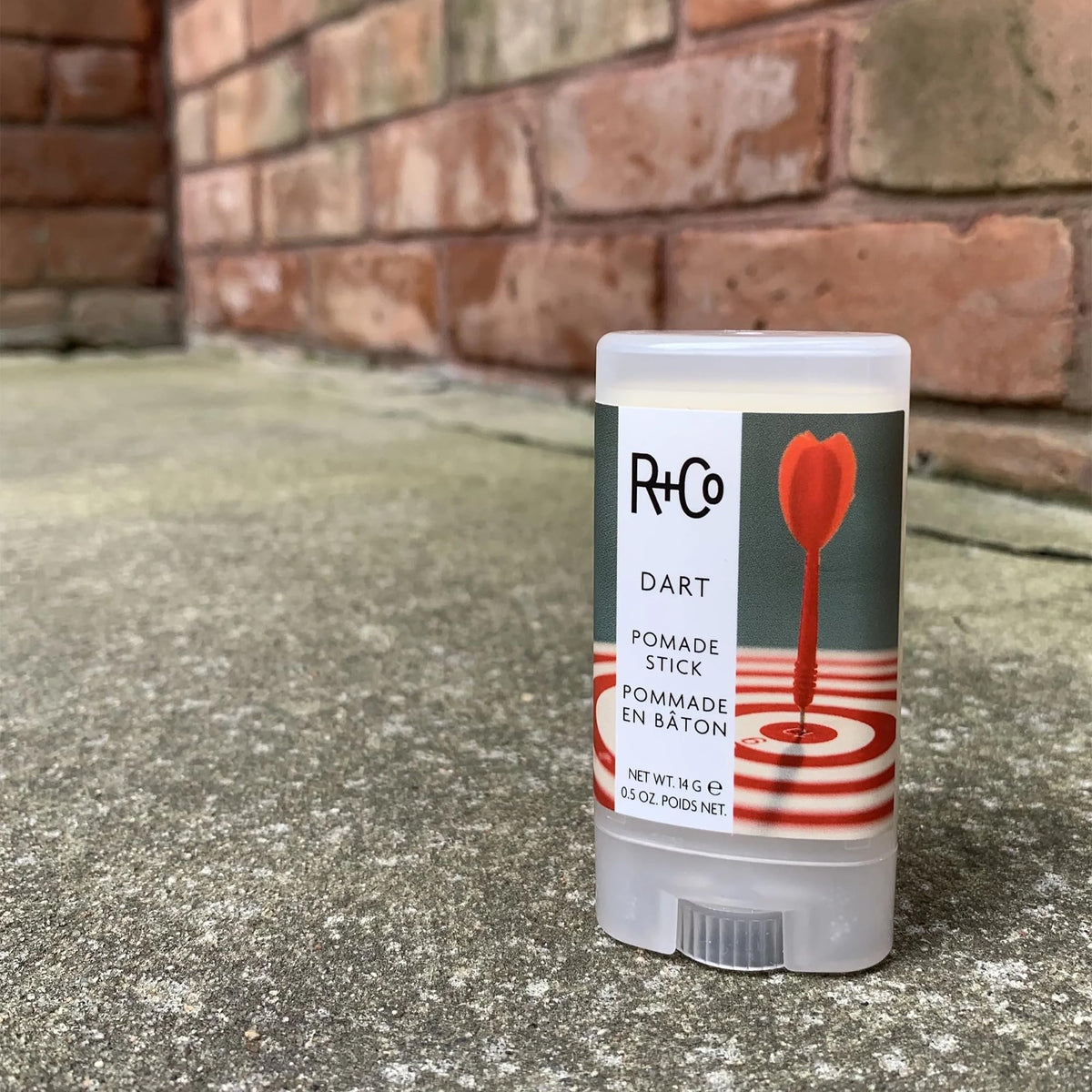 R+Co Dart Pomade Stick boxed packaging ready for daily grooming.