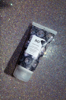 Glossy hair reflects light, illustrating UV protection and sealed cuticles