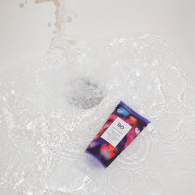 R+Co Sunset Blvd ingredients display emphasizing Violet Flower for color balance