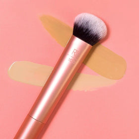 Real Techniques brush used with cream or liquid foundation for an even blend.