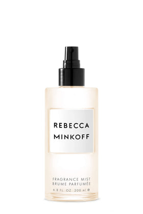 Rebecca Minkoff body spray opening with cardamom, coriander, bergamot for a bright start.