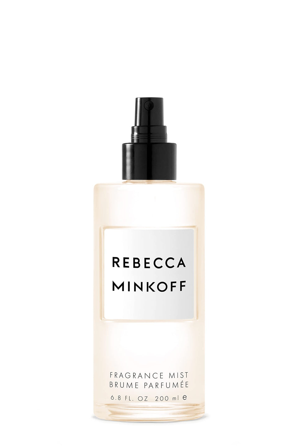 Rebecca Minkoff body spray opening with cardamom, coriander, bergamot for a bright start.