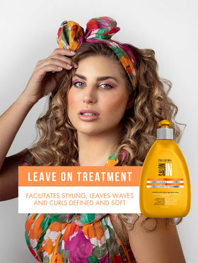 Recamier Salon In leave-in cream application showing easier styling and frizz control