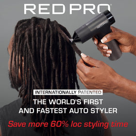RED Pro cordless auto loc styler in use on natural hair during a session.