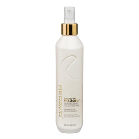 Redavid Orchid Oil bottle pour showing lightweight frizz control for curls.