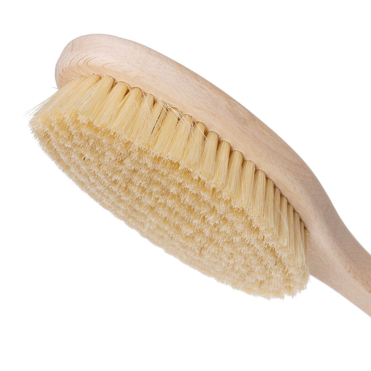 Redecker back brush close-up showing natural pig bristle fibers for gentle exfoliation.