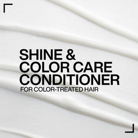 Redken Acidic Color Gloss Conditioner packaging highlights color protection and vibrant results.