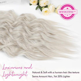 Four-weft REECHO platinum blonde extensions arranged for versatile placement and natural fullness