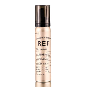 REF 345 Fiber Mousse bottle promotes volume and texture for fuller-looking hair.