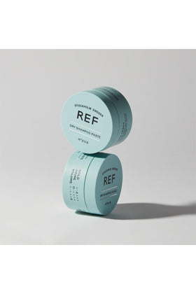 REF dry shampoo paste tube demonstrates easy handling for quick on-hair application