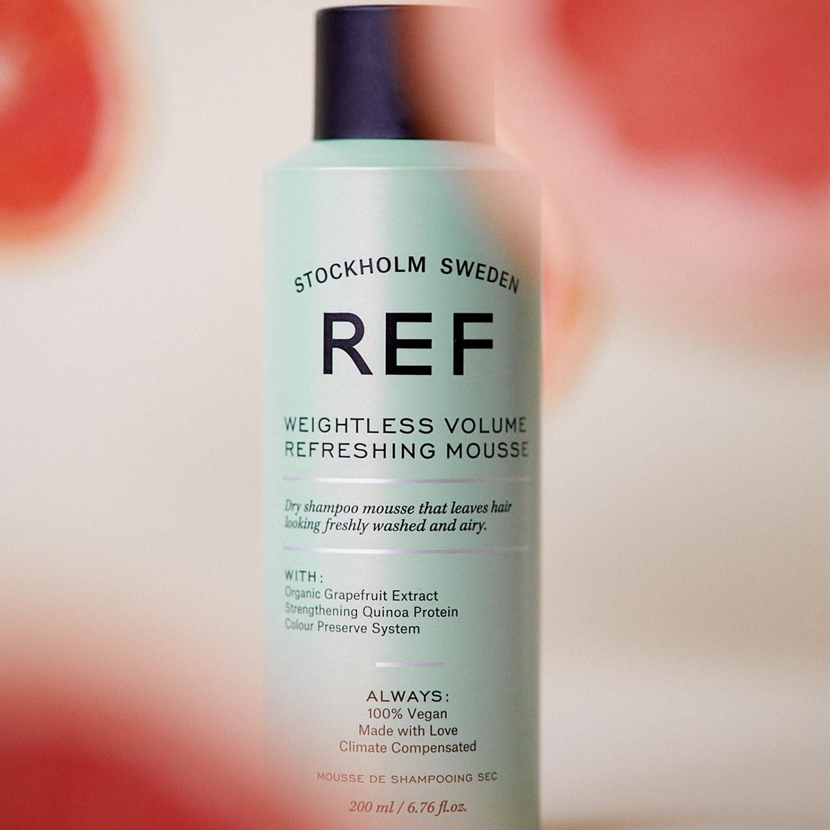 REF Weightless Volume Mousse hair texture shot shows weightless, voluminous finish.