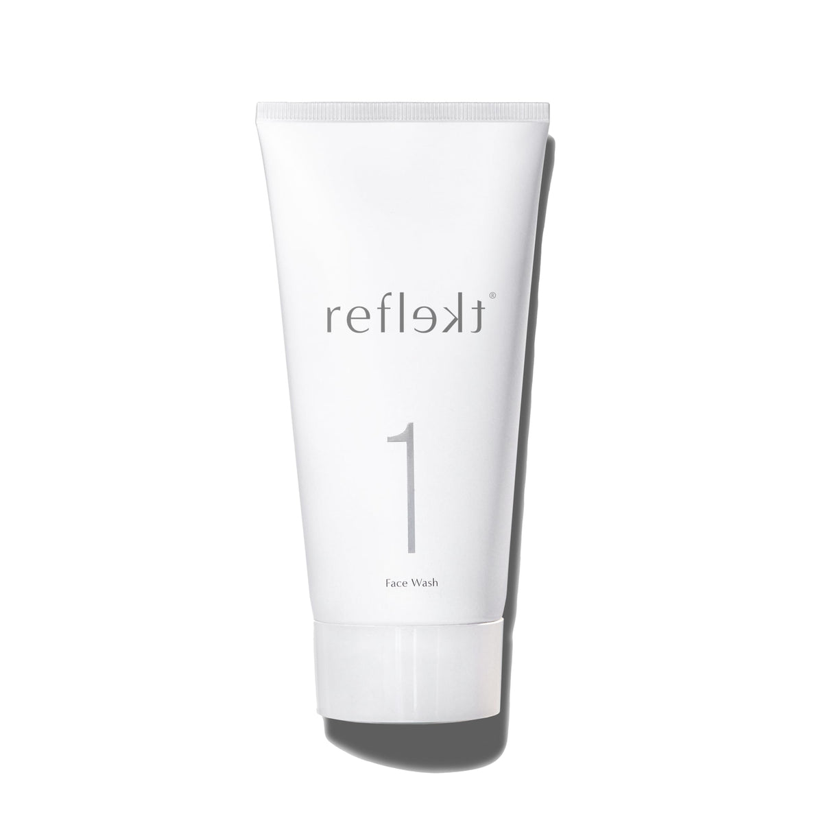 REFLEKT 1 bottle with jojoba ester beads for gentle exfoliation and clear pores.
