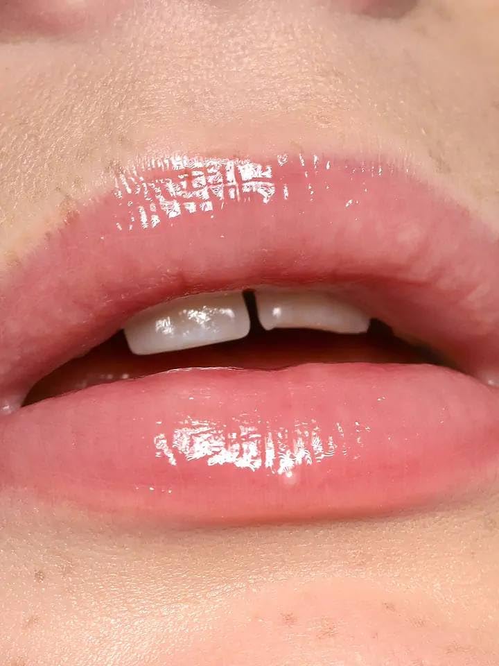 REFY Lip Gloss Blush applied on lips for a smooth, glossy finish
