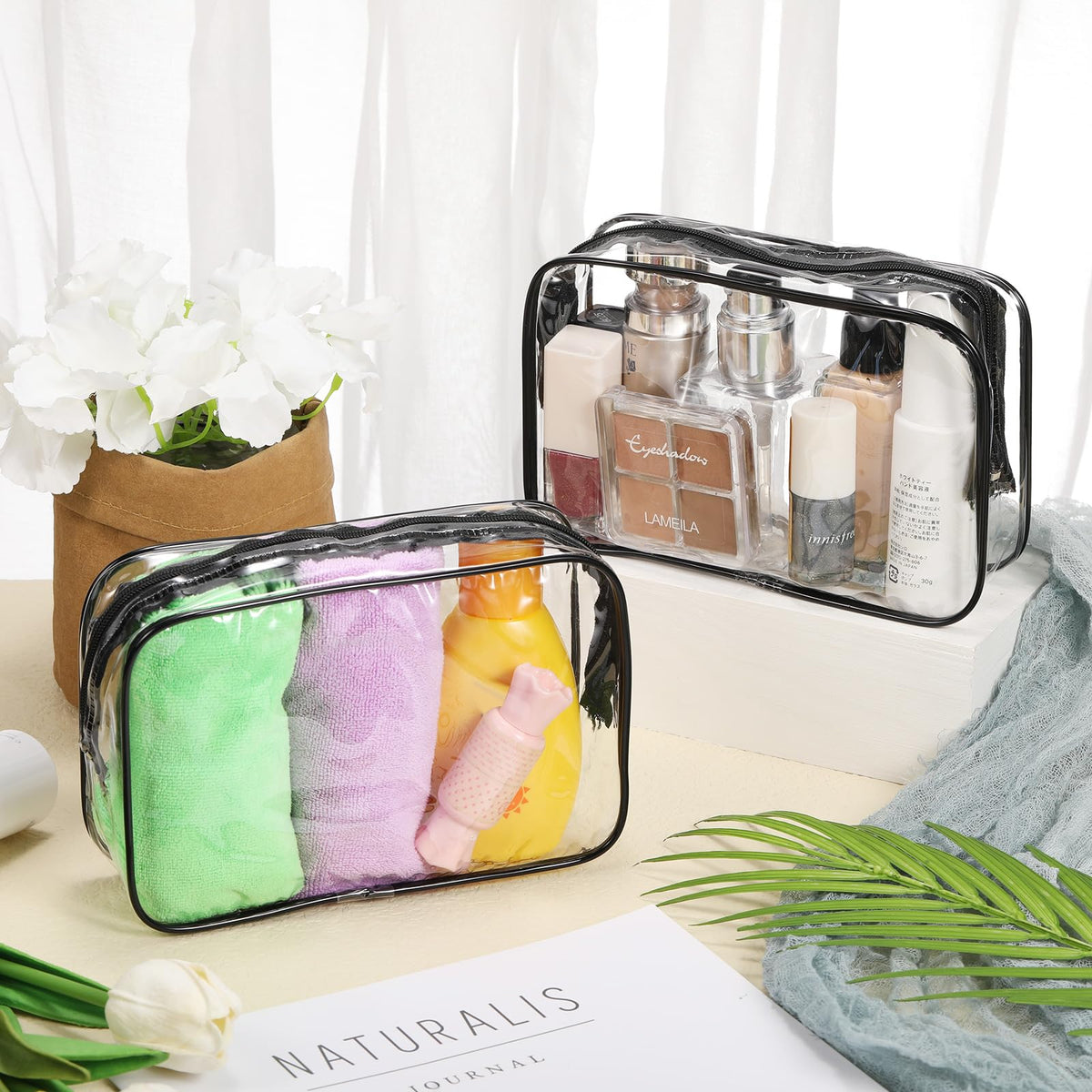 Reginary travel cosmetic bag inside view shows easy visibility