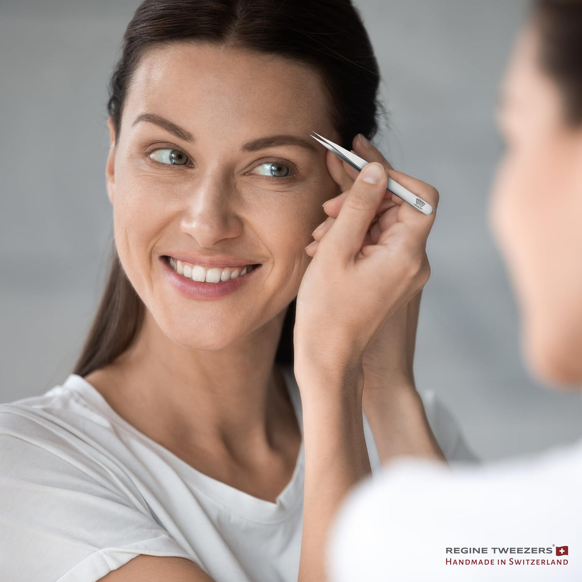 Regine Switzerland professional-grade tweezers suitable for salon and home use.
