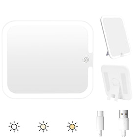 Relavel makeup mirror with lights attached to a bag for quick touch-ups.