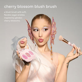 Rem Beauty Wicked Cherry Blossom Blush Brush helps blend color for seamless finish.