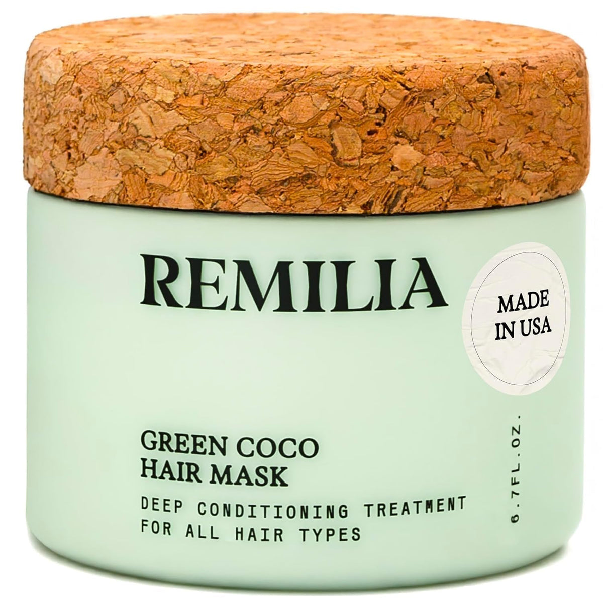Remilia Hair Green Coco Mask bottle pouring for lightweight conditioning at home