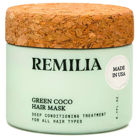 Remilia Hair Green Coco Mask bottle pouring for lightweight conditioning at home