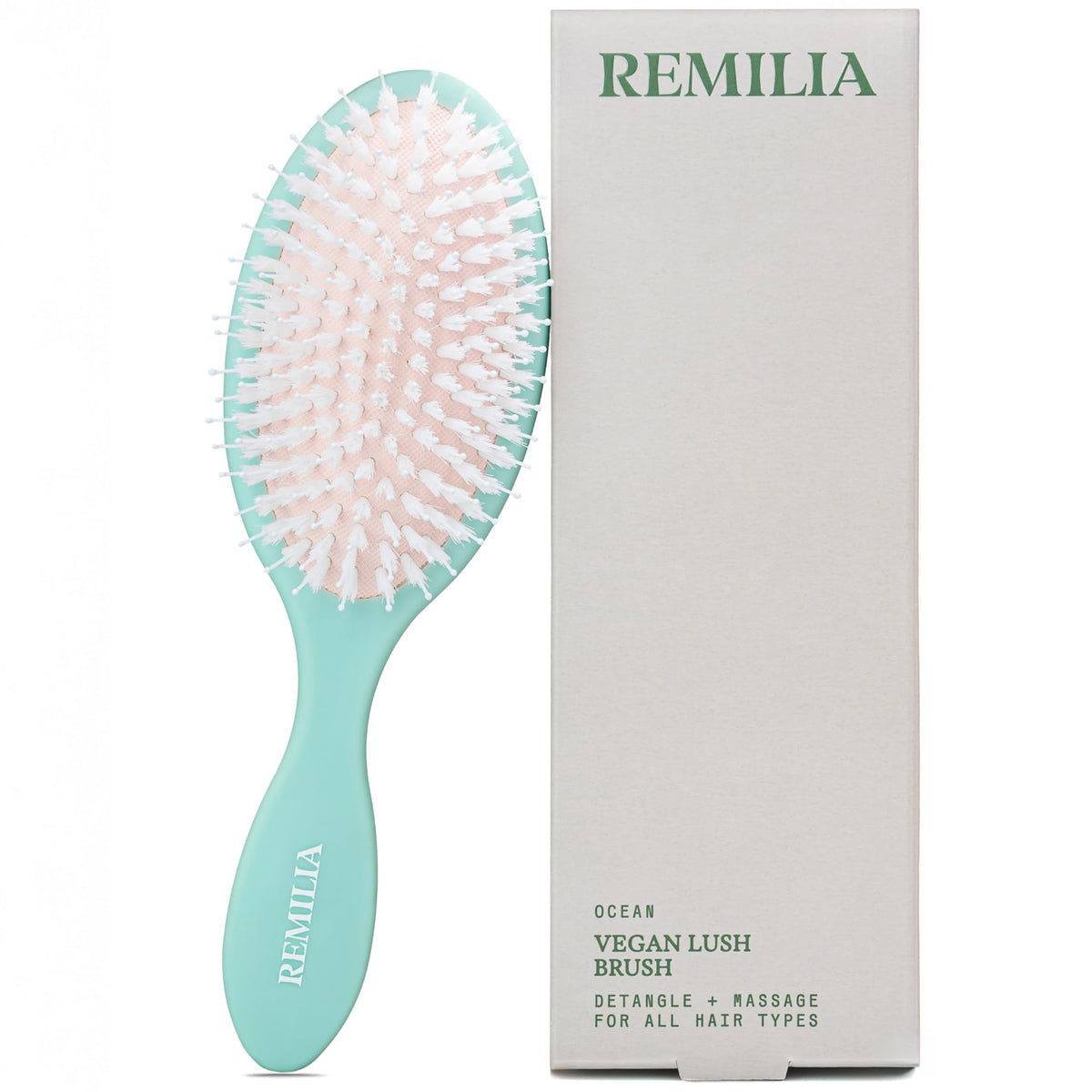 Remilia Ocean Vegan Lush Brush gliding through hair for gentle detangling.