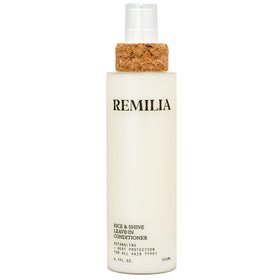 Remilia Rice & Shine leave-in bottle-dispense for easy detangling before styling.