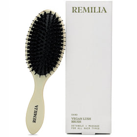 Remilia Vegan Lush Brush detailed detangle for gentle, snag-free styling.