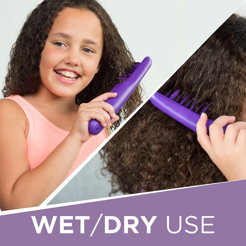 Remington Tame the Mane in use on wet hair for smooth detangling.