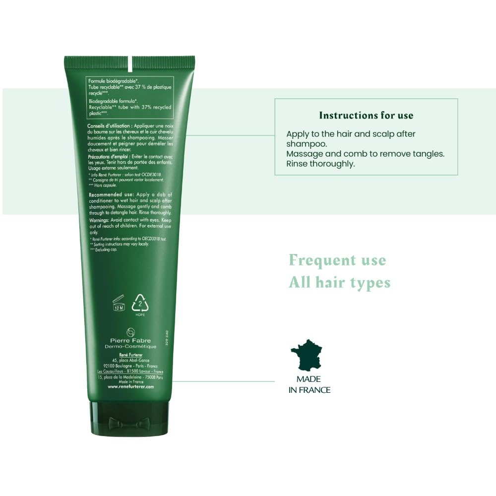 René Furterer Forticea Strengthening Conditioner applied to hair for nourishment.