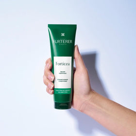 René Furterer Forticea Strengthening Conditioner results panel hints stronger hair.