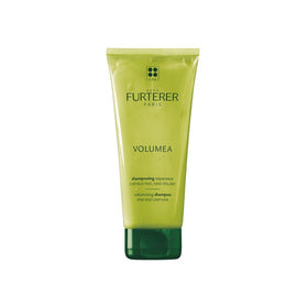 René Furterer Volumea bottle pour demonstrates lightweight volume for fine hair.