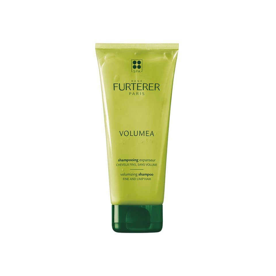 René Furterer Volumea bottle pour demonstrates lightweight volume for fine hair.