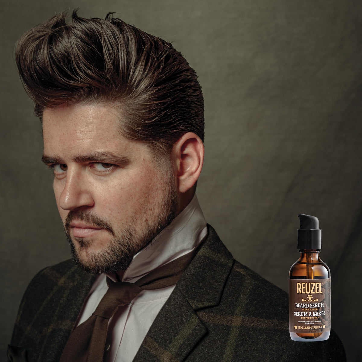 REUZEL beard care setup with citrus mint scent.