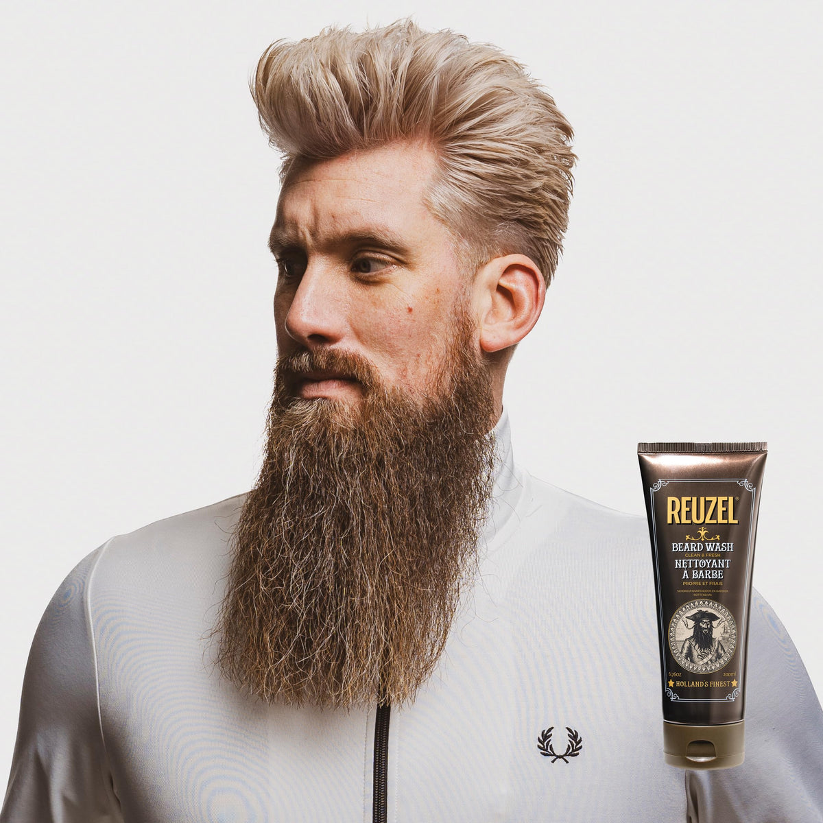 Close-up of rinsed beard with REUZEL wash enhancing softness and moisture.