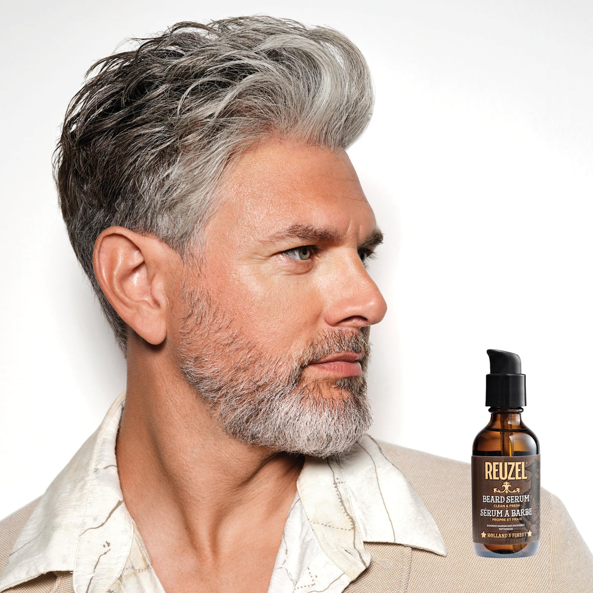 REUZEL Clean & Fresh beard serum pump shows easy, mess-free dispensing and lightweight finish.