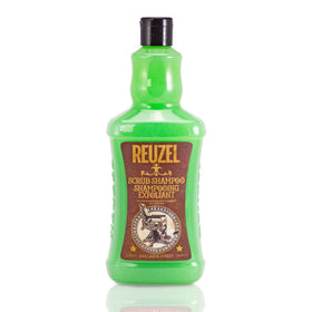 Reuzel Scrub Shampoo bottle close-up: clarifies buildup and oils for a refreshed scalp.