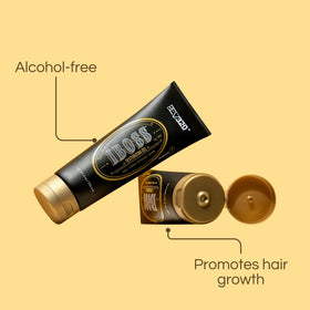 Rev320 iBOSS gel in hands styling moment showing flexible hold for textured looks