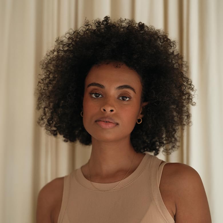 Hair with Hymn Hair Gel showing added volume and softness