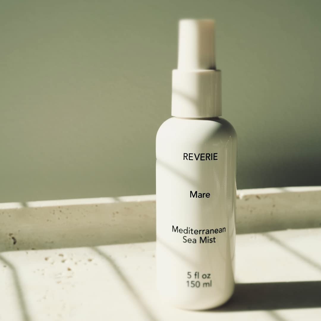 REVERIE Natural Mare Sea Mist spray demonstrates easy application for waves